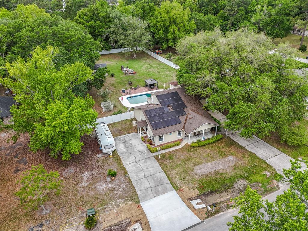 6380 Bahaia Road Fleming Island, FL 32003 - Photo 72 of 77 an aerial view of a house with a yard