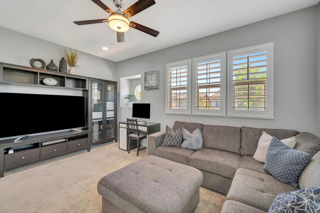 21408 Trail Ridge Drive Escondido, CA 92029 - Photo 18 of 50 a living room with furniture and a flat screen tv