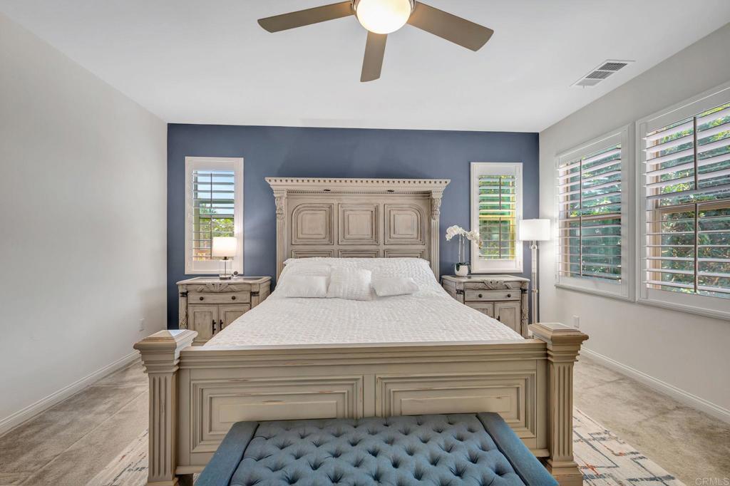 21408 Trail Ridge Drive Escondido, CA 92029 - Photo 19 of 50 a bedroom with a bed and a large window