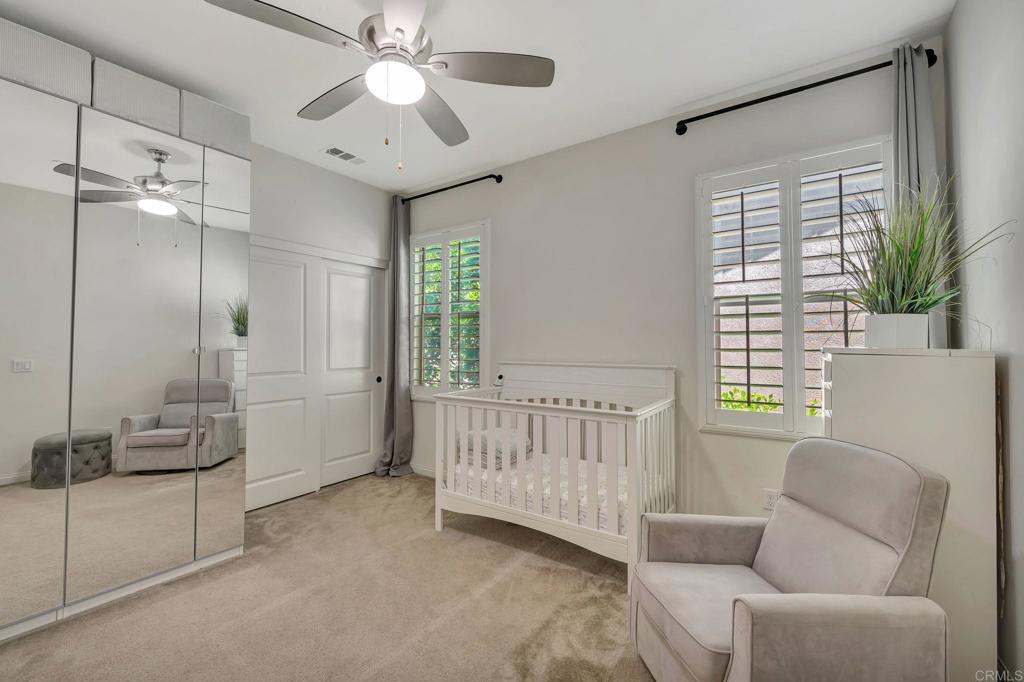 21408 Trail Ridge Drive Escondido, CA 92029 - Photo 31 of 50 a living room with furniture and a chandelier