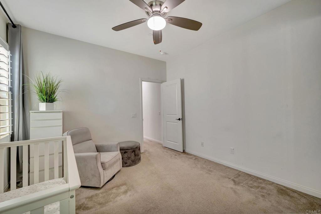 21408 Trail Ridge Drive Escondido, CA 92029 - Photo 32 of 50 a living room with furniture and a potted plant
