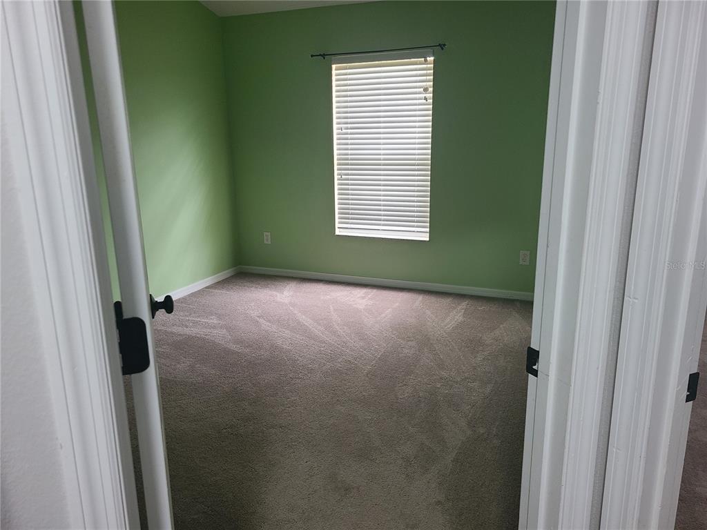 14956 Amberjack Terrace, Unit 103 Lakewood Ranch, FL 34202 - Photo 13 of 16 a view of a room that has a window in it