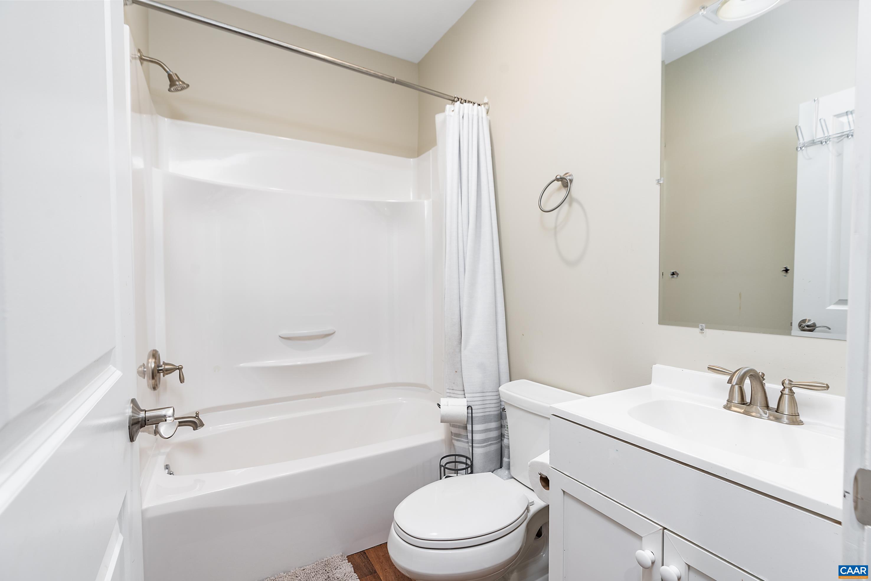 5478 Park Road Crozet, VA 22932 - Photo 21 of 24 a bathroom with a sink a toilet and a bathtub