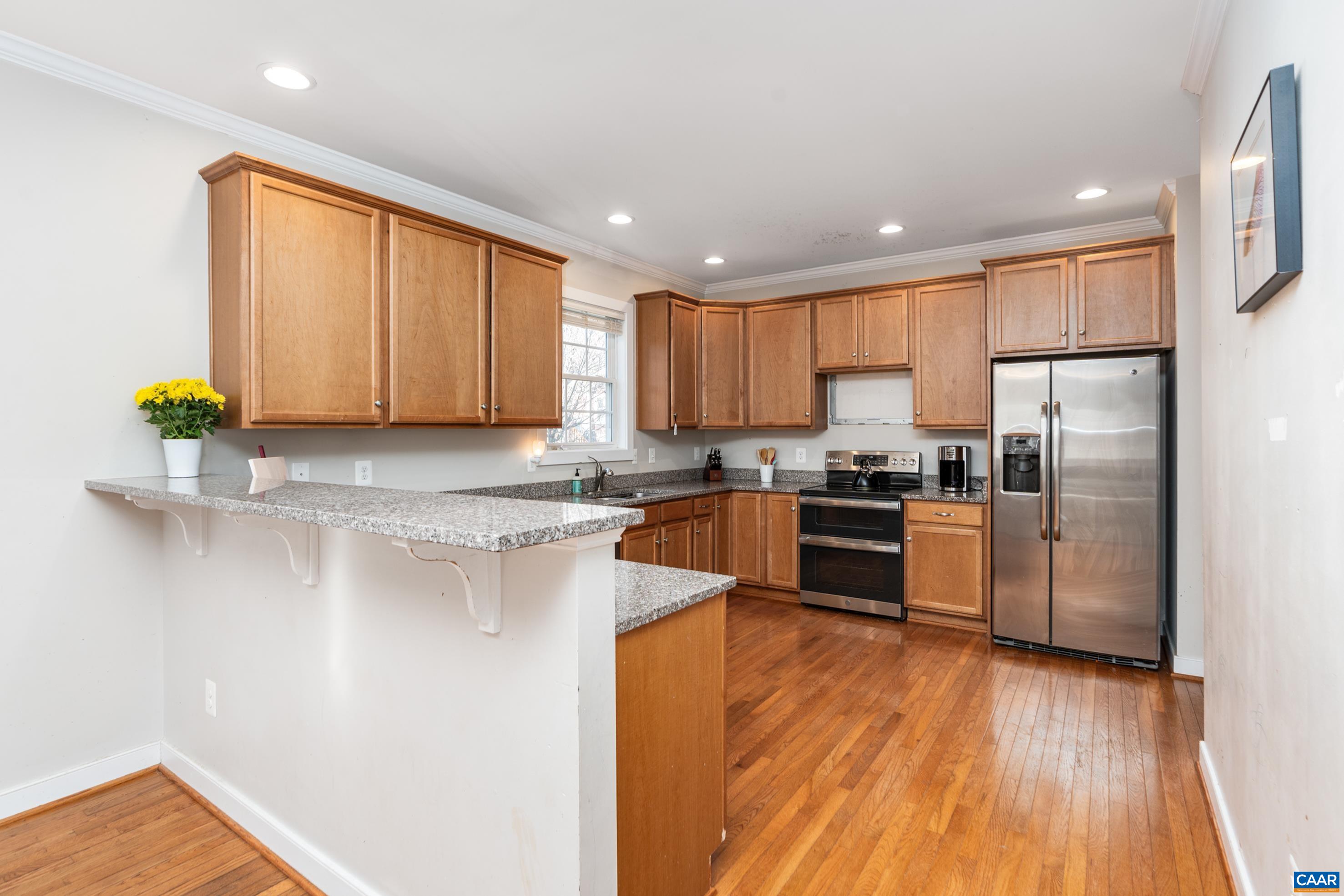5478 Park Road Crozet, VA 22932 - Photo 5 of 24 a kitchen with stainless steel appliances granite countertop a refrigerator sink and cabinets