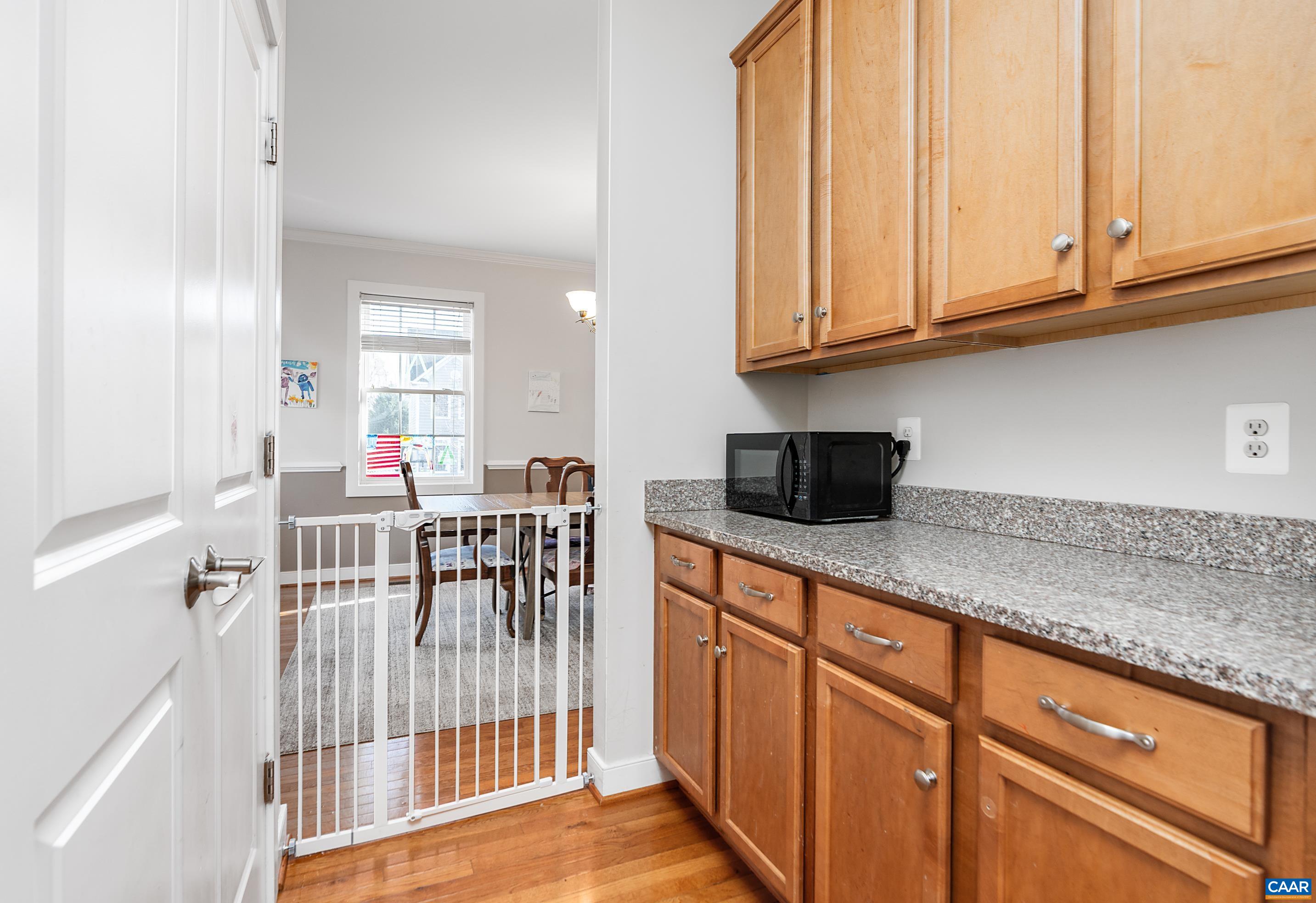 5478 Park Road Crozet, VA 22932 - Photo 7 of 24 a kitchen with stainless steel appliances granite countertop a sink and cabinets