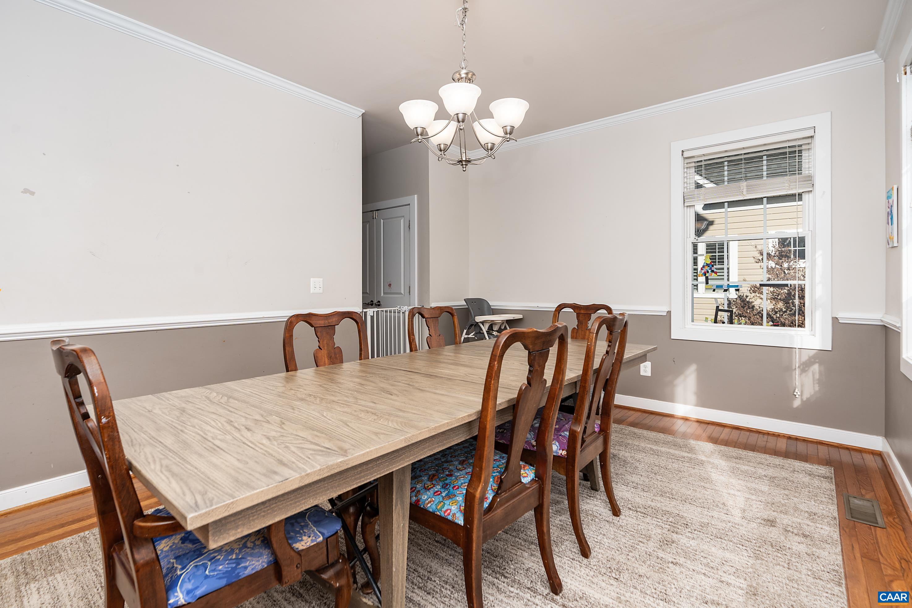 5478 Park Road Crozet, VA 22932 - Photo 8 of 24 a view of a dining room with furniture and wooden floor