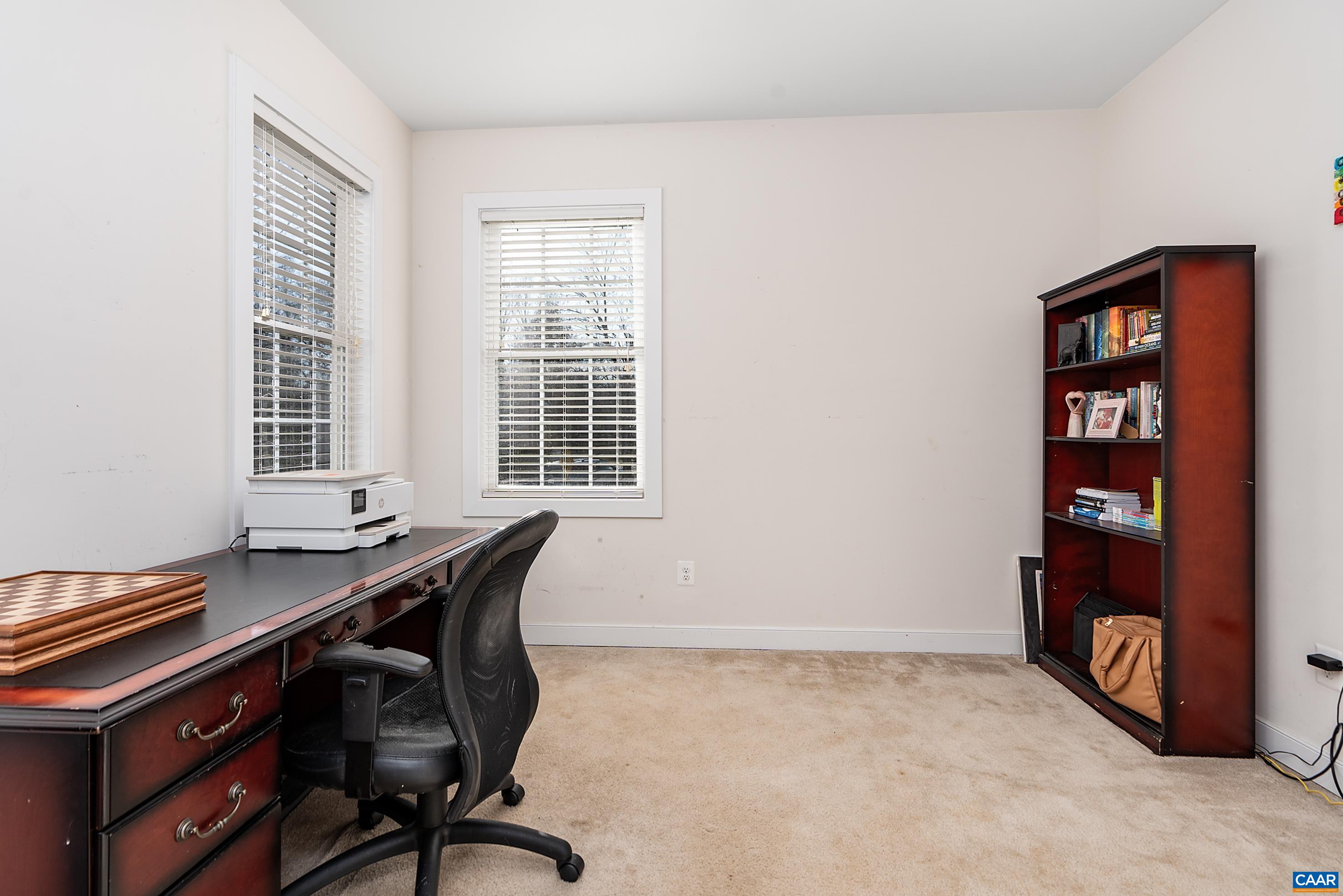 5478 Park Road Crozet, VA 22932 - Photo 9 of 24 a view of a workspace with furniture and a window