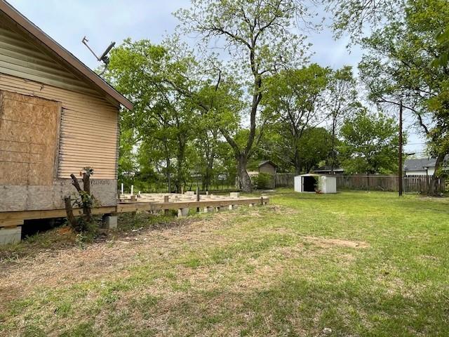 515 East Murray Street Denison, TX 75021 - Photo 4 of 22 View of yard featuring a shed