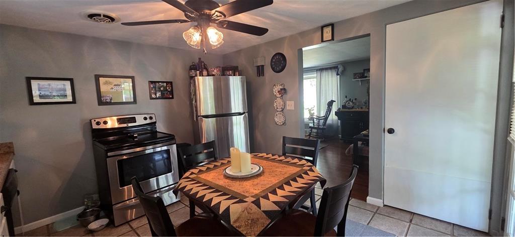 551 Muse-Bishop Road McDonald, PA 15057 - Photo 9 of 38 a view of a dining room with furniture and a refrigerator