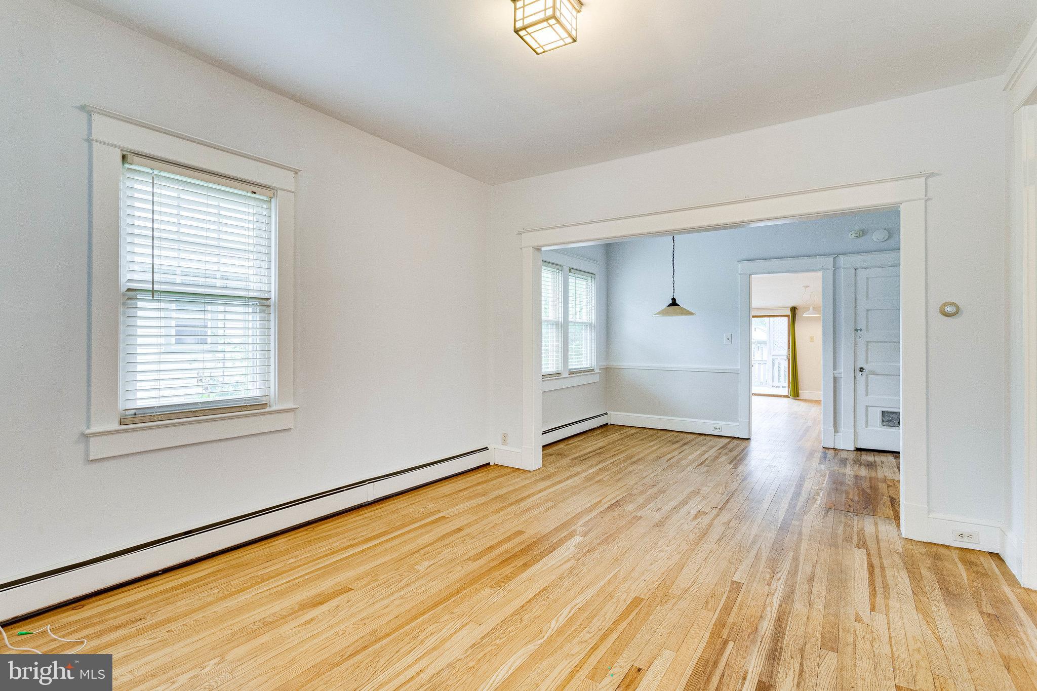 721 Boundary Avenue Silver Spring, MD 20910 - Photo 3 of 17 Large living and dining areas with hardwood floors
