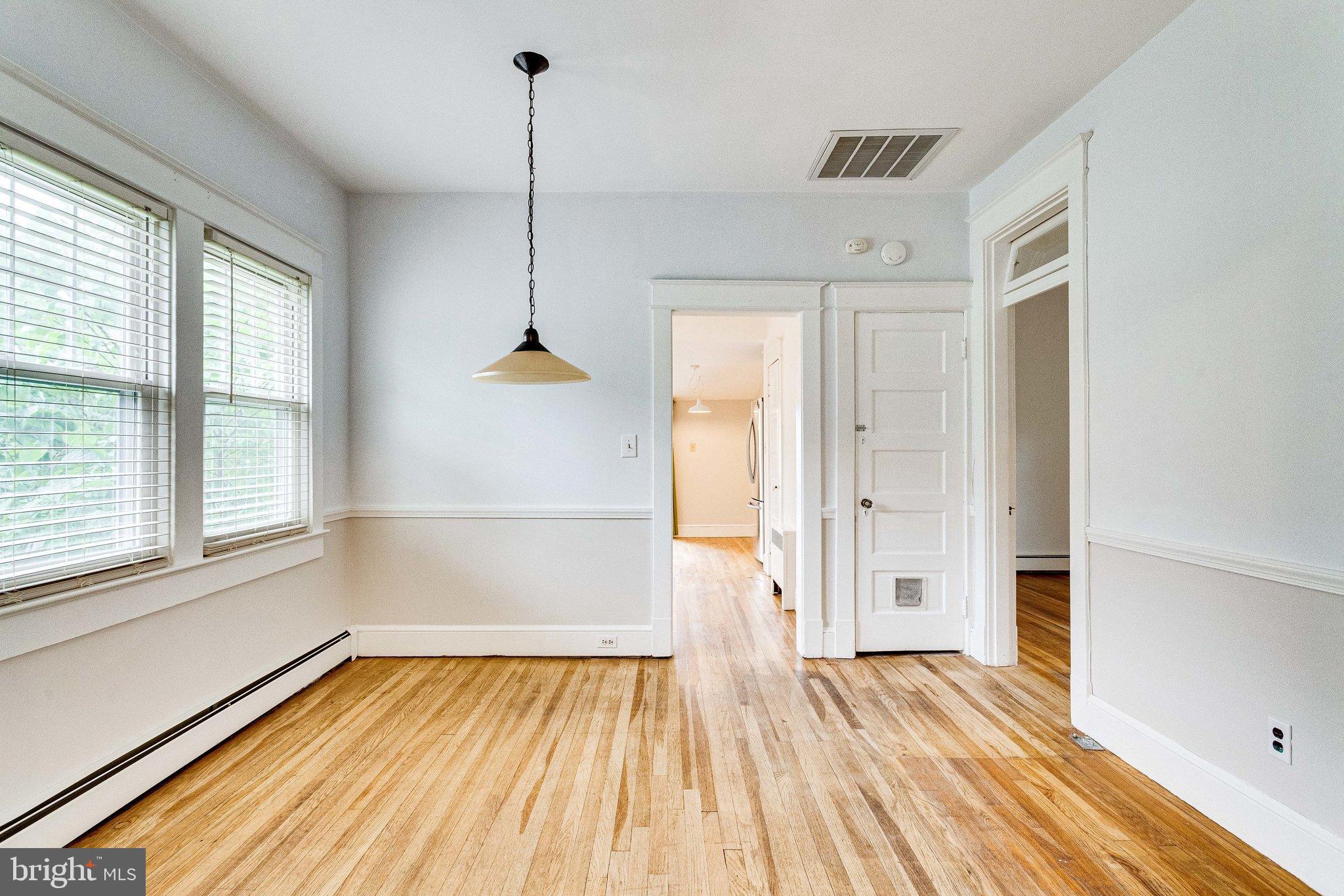 721 Boundary Avenue Silver Spring, MD 20910 - Photo 4 of 17 Large dining area with hardwood floors