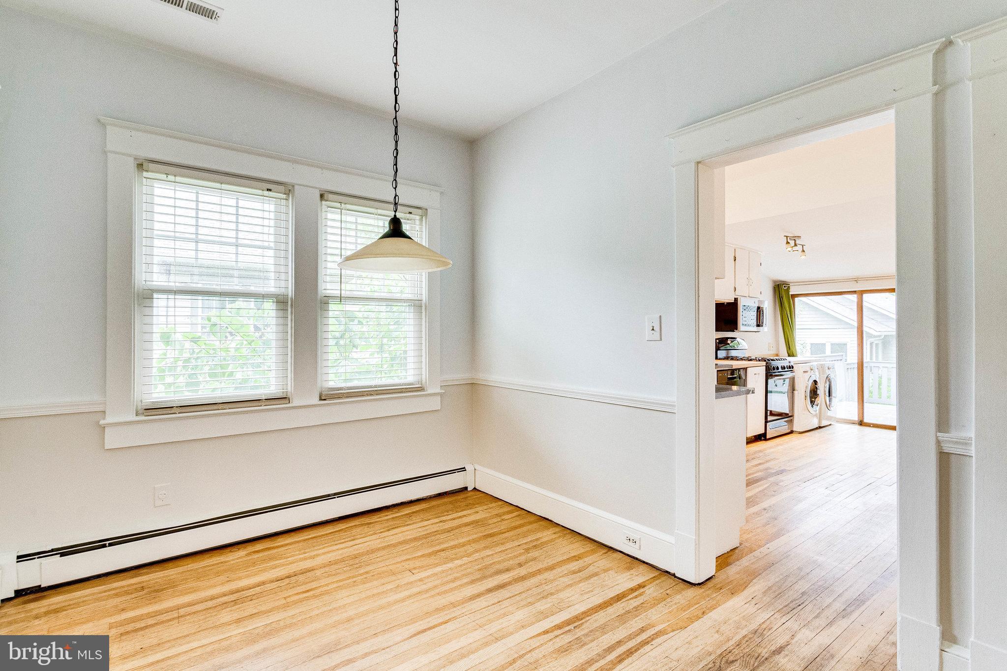 721 Boundary Avenue Silver Spring, MD 20910 - Photo 5 of 17 Dining room area with kitchen on background