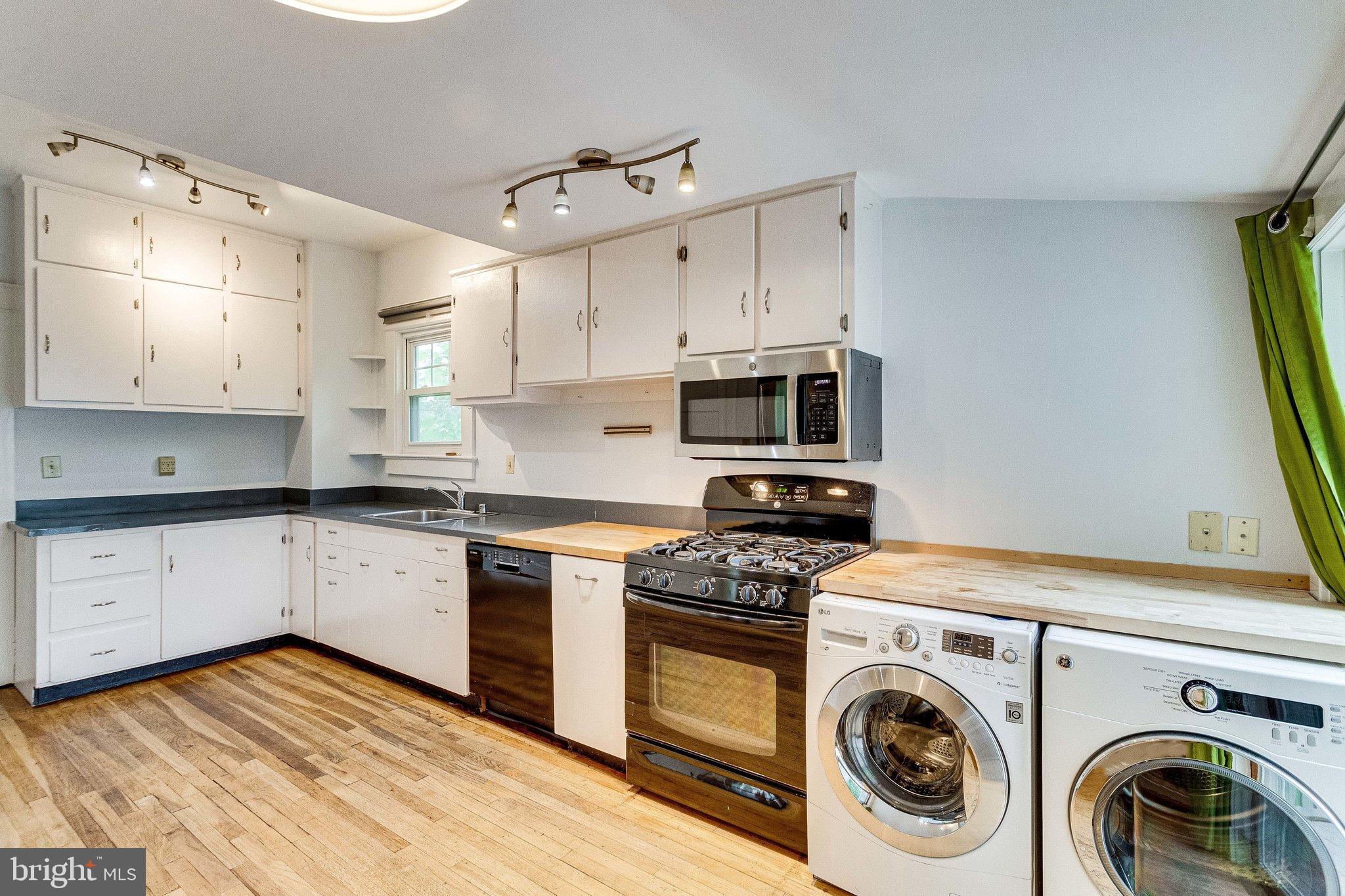 721 Boundary Avenue Silver Spring, MD 20910 - Photo 7 of 17 Kitchen with washer and dryer