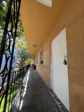 a view of a house with a trees