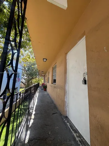 a view of a house with a trees