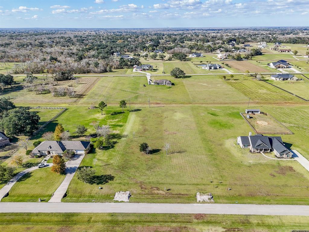 702 Comanche Trail Drive Rosharon, TX 77583 - Photo 14 of 24 with view of residential houses with outdoor space