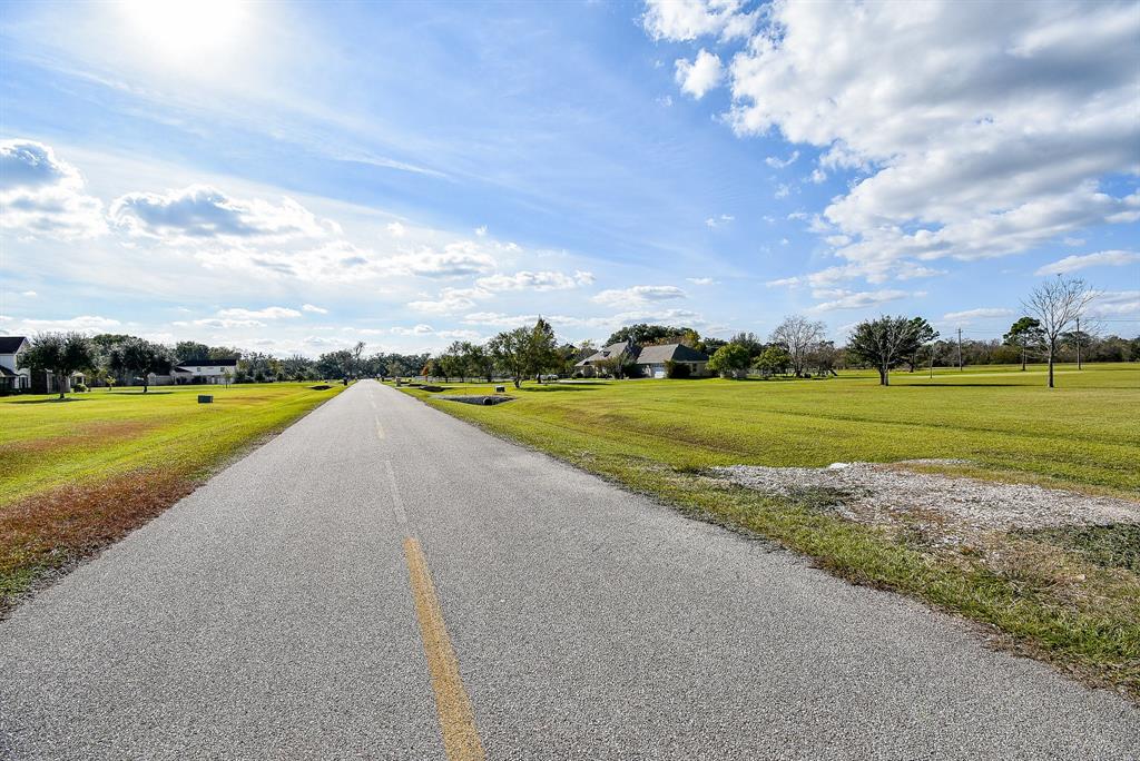 702 Comanche Trail Drive Rosharon, TX 77583 - Photo 5 of 24 a view of a city and lake