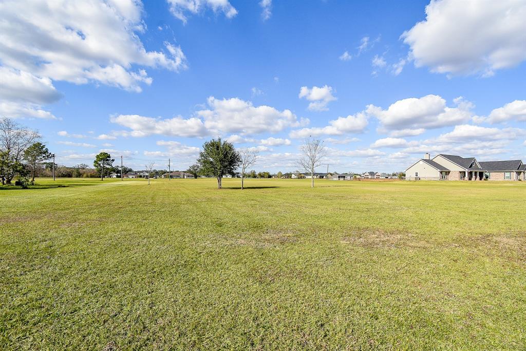 702 Comanche Trail Drive Rosharon, TX 77583 - Photo 9 of 24 a view of an ocean and beach