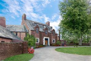 a view of a building with a garden