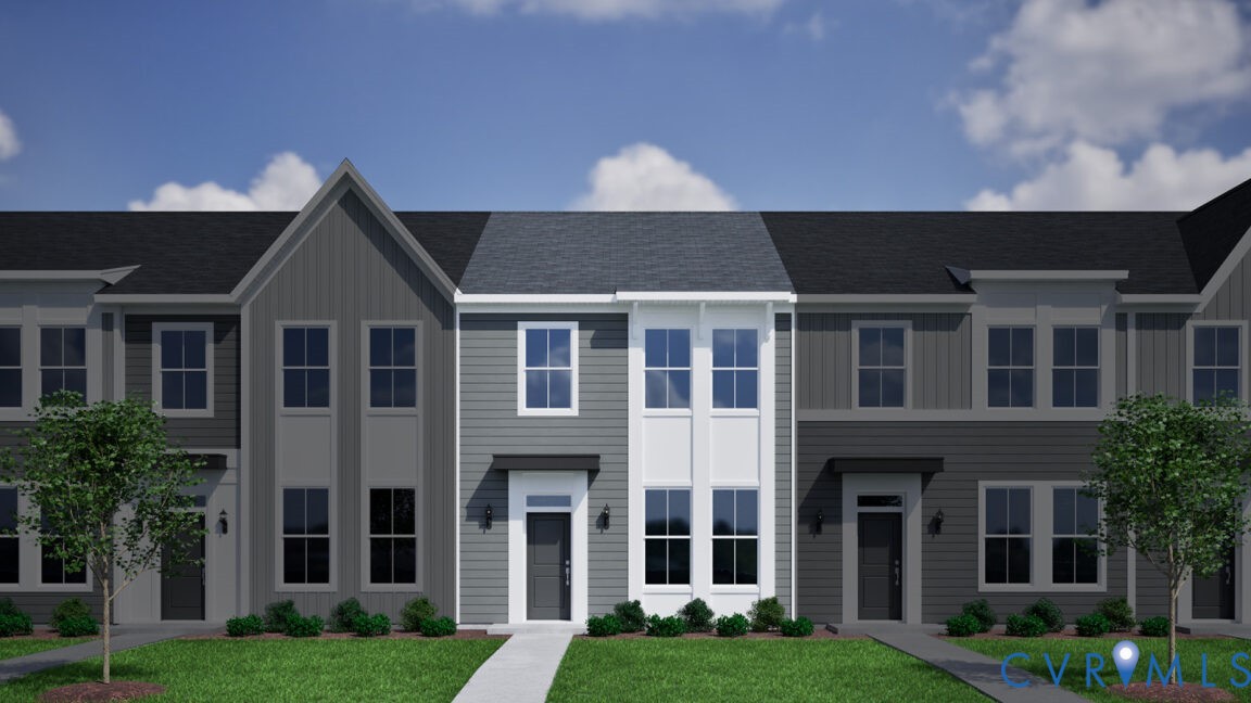 a front view of a house with a yard and porch