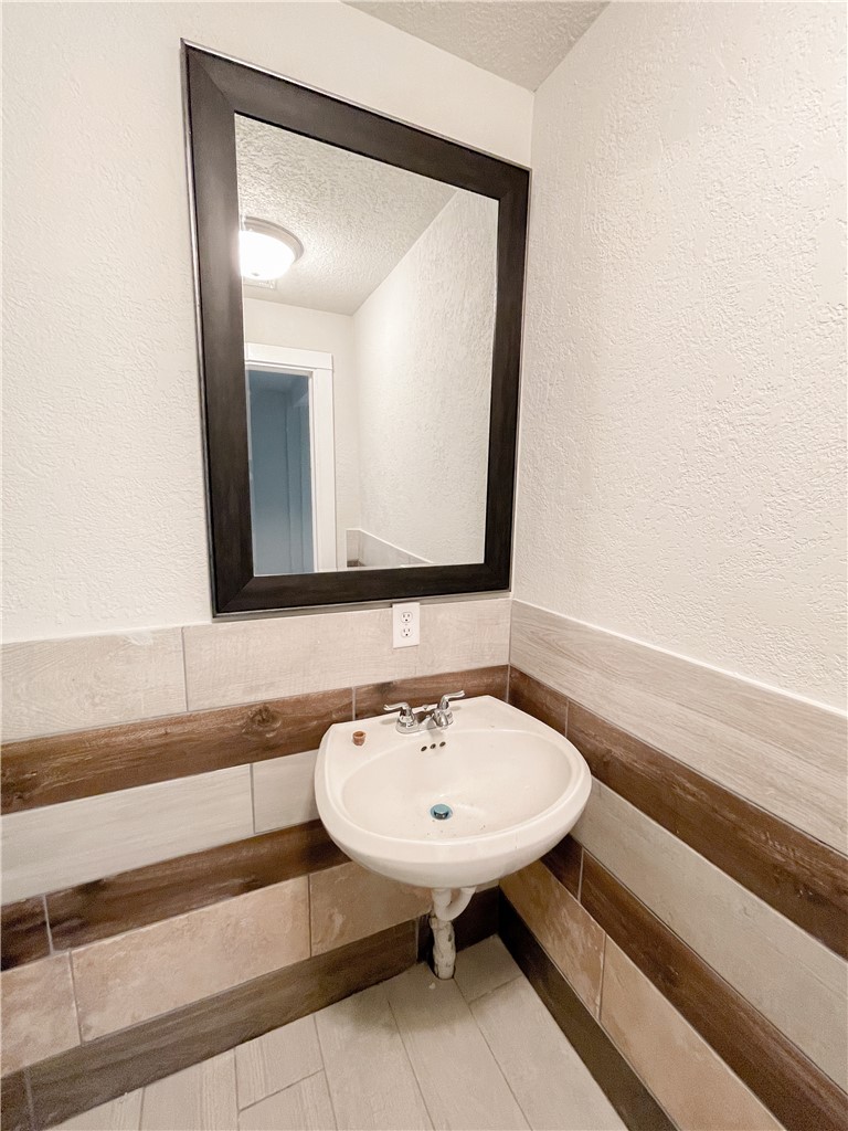 738 Commerce Street Bryan, TX 77803 - Photo 5 of 15 Disclaimer: Some photos in this listing have been virtually staged for visual representation. Furniture, decor, and other digitally added items are not included with the property. Actual features and finishes may vary. All images, photographs and dimensions are not intended to be relied upon for, nor to form part of, any contract unless specifically incorporated in writing into the contract.