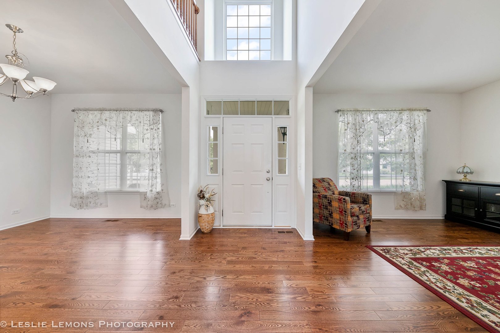 3027 Patterson Road Montgomery, IL 60538 - Photo 2 of 32 a view of livingroom with furniture window and wooden floor