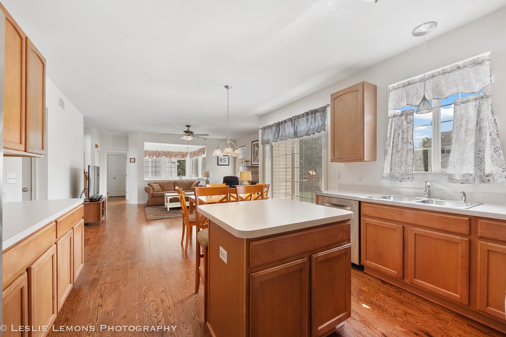 3027 Patterson Road Montgomery, IL 60538 - Photo 11 of 32 a kitchen with a sink stove and cabinets
