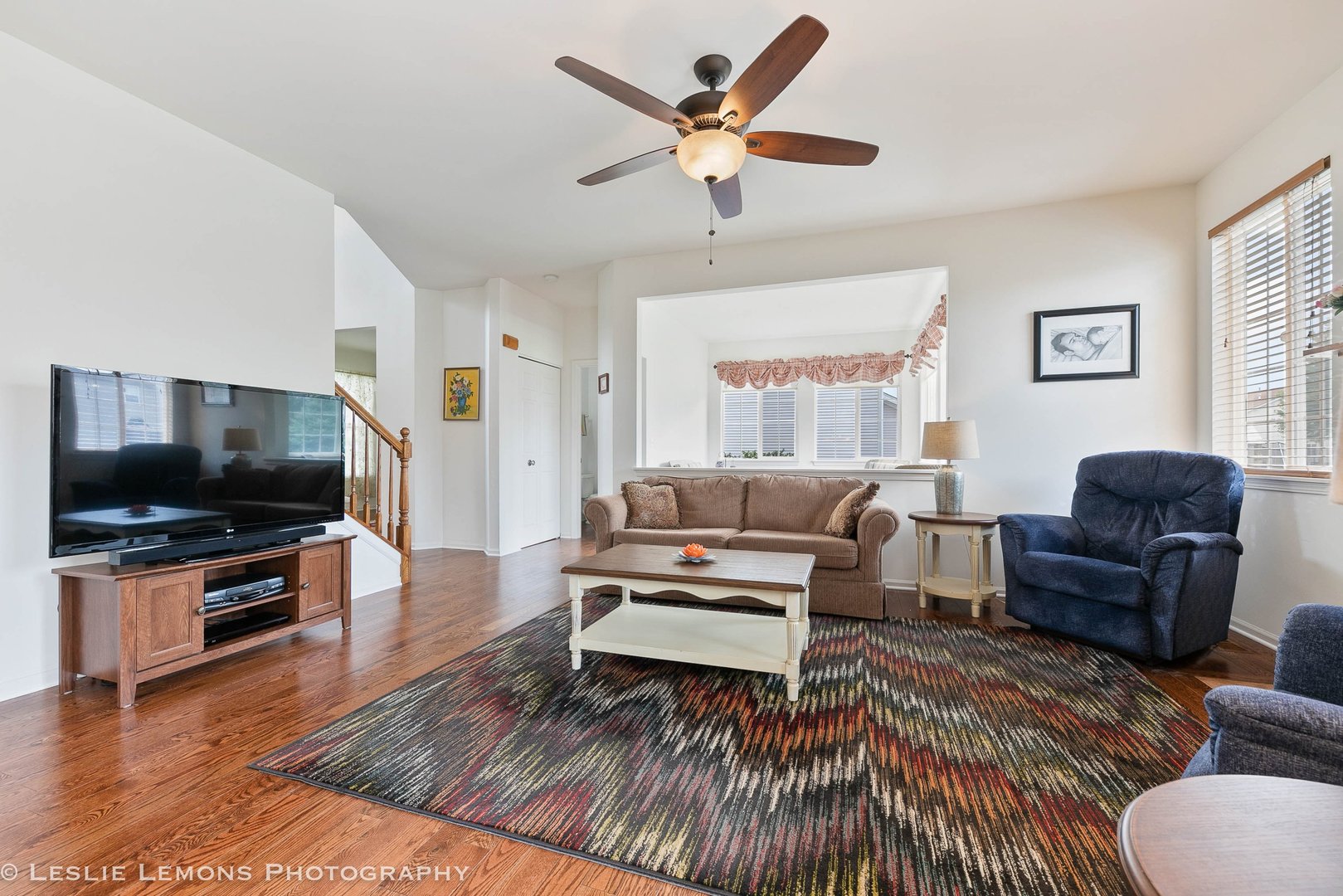 3027 Patterson Road Montgomery, IL 60538 - Photo 13 of 32 a living room with furniture and a flat screen tv