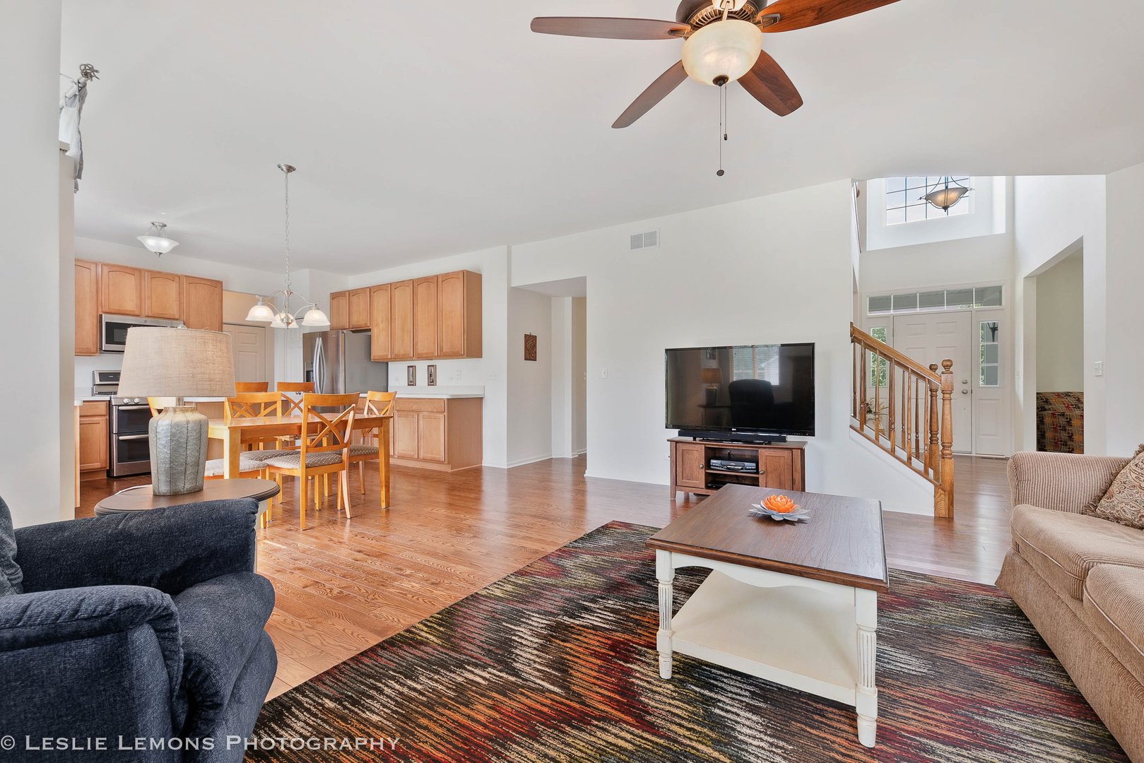 3027 Patterson Road Montgomery, IL 60538 - Photo 14 of 32 a living room with furniture and a flat screen tv