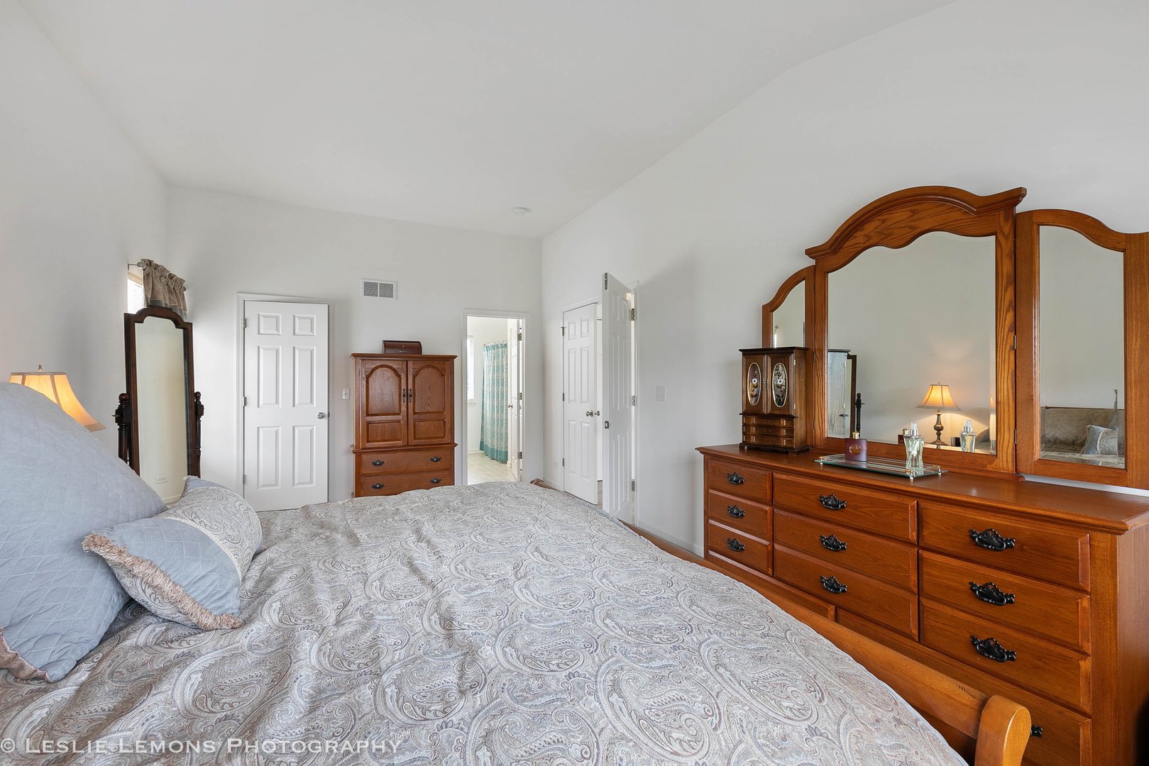 3027 Patterson Road Montgomery, IL 60538 - Photo 21 of 32 a bedroom with a large bed and a dresser