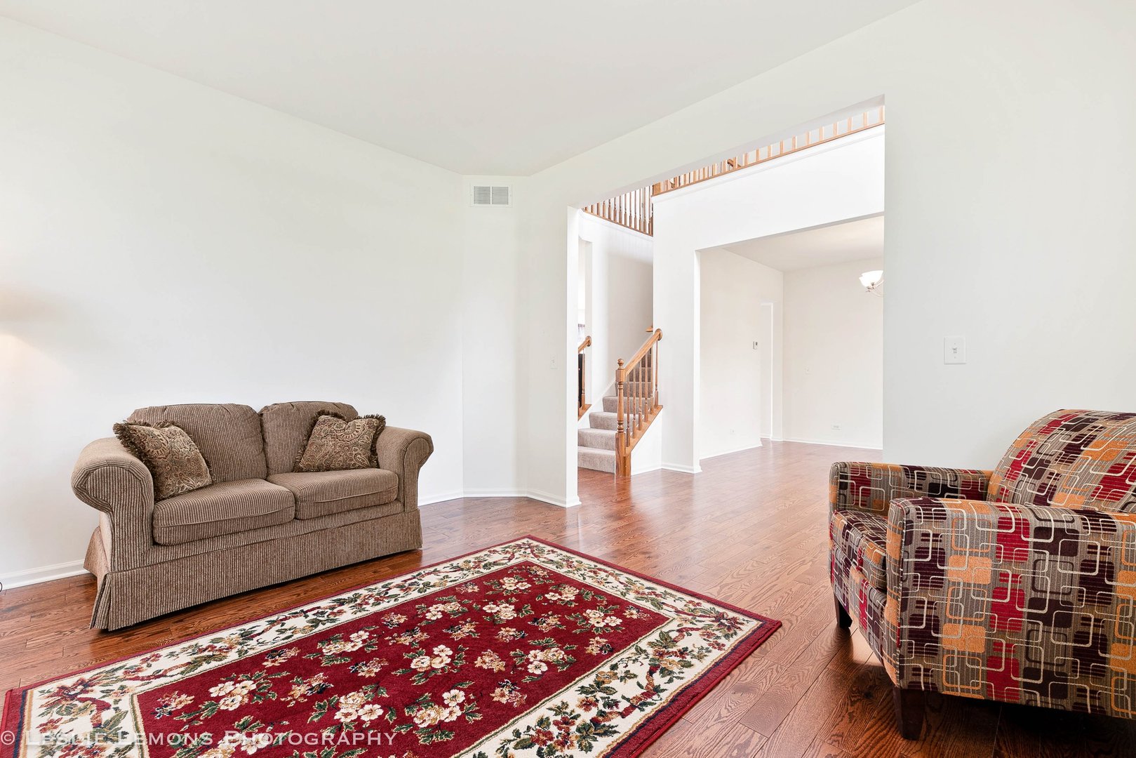 3027 Patterson Road Montgomery, IL 60538 - Photo 4 of 32 a living room with furniture and a rug
