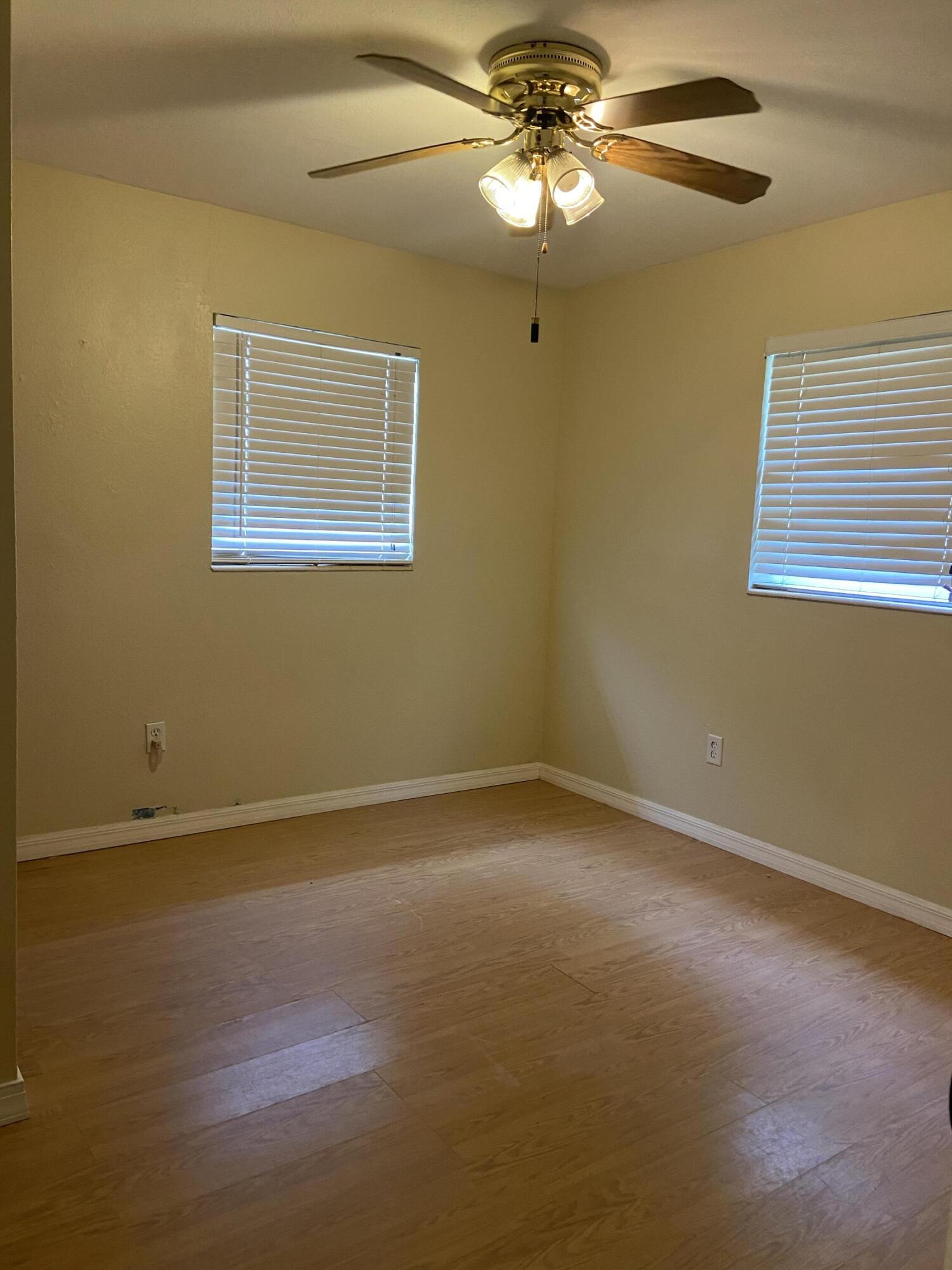 2544 Coventry Road Melbourne, FL 32935 - Photo 13 of 16 a view of an empty room with a window