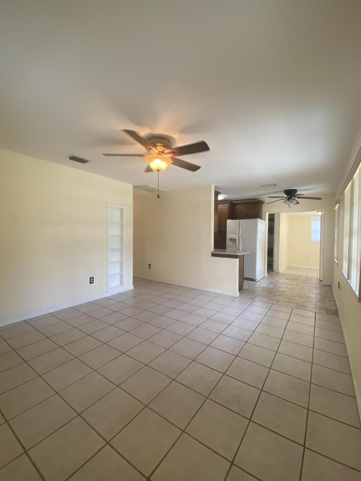 2544 Coventry Road Melbourne, FL 32935 - Photo 4 of 16 a view of a livingroom and entryway