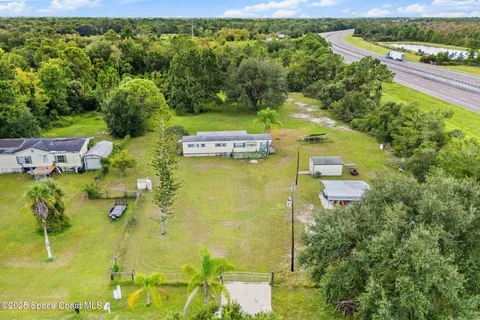 a view of a lake with a building in the background