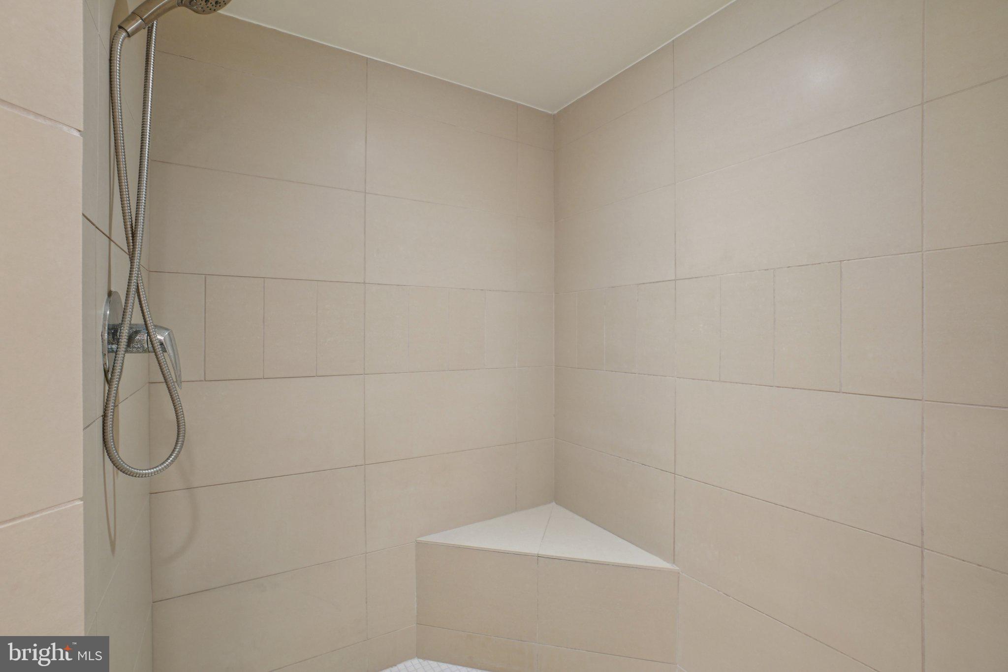 1515 15th Street Northwest, Unit 206 Washington, DC 20005 - Photo 19 of 32 a bathroom with a shower