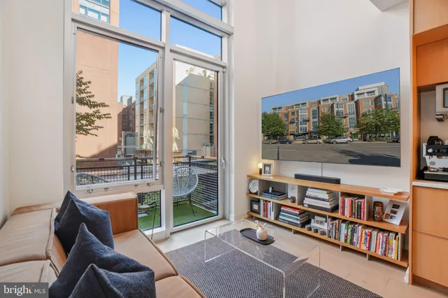 a room with furniture and a book shelf