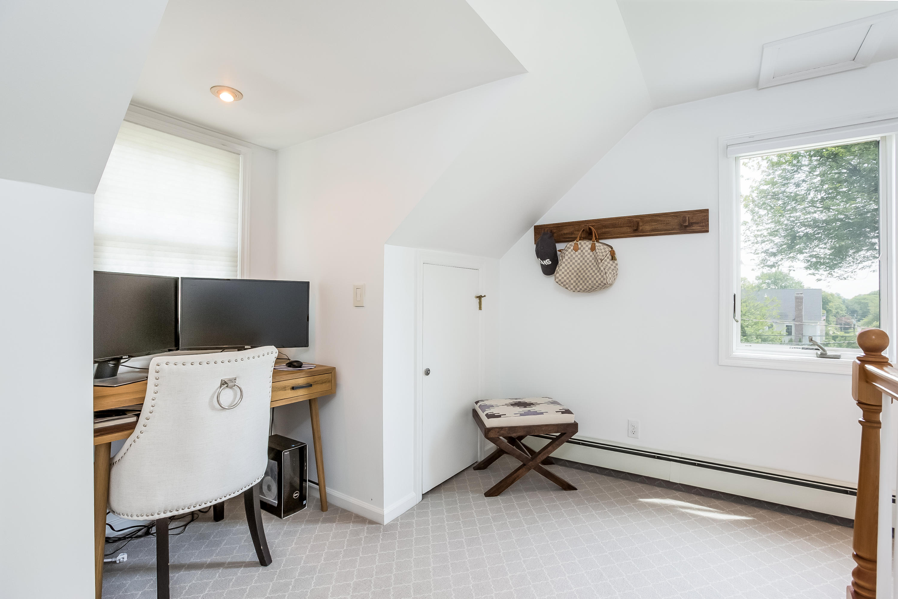 82 Linden Avenue Darien, CT 06820 - Photo 19 of 28 a view of a workspace with furniture and a window