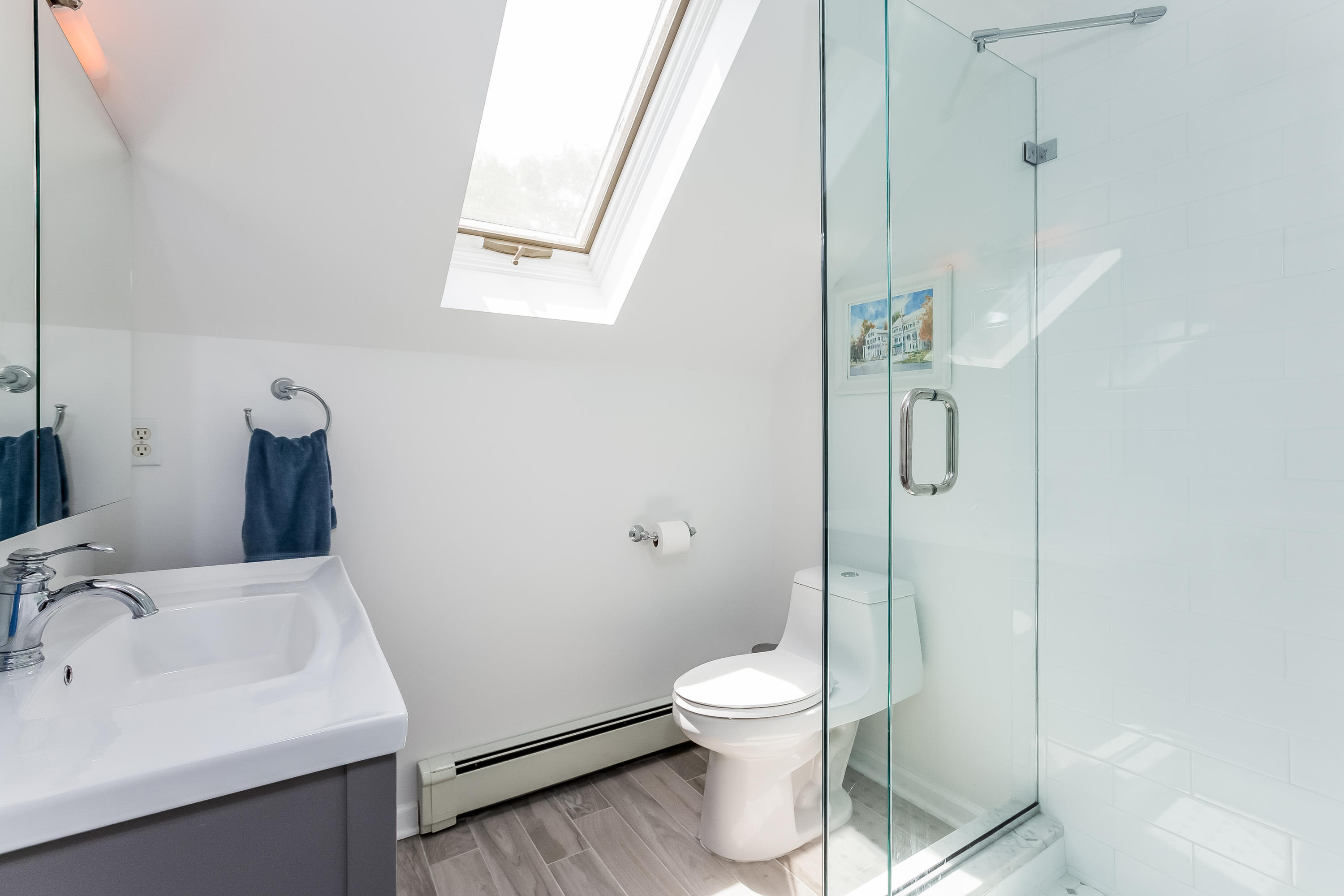 82 Linden Avenue Darien, CT 06820 - Photo 22 of 28 a bathroom with a sink toilet and shower