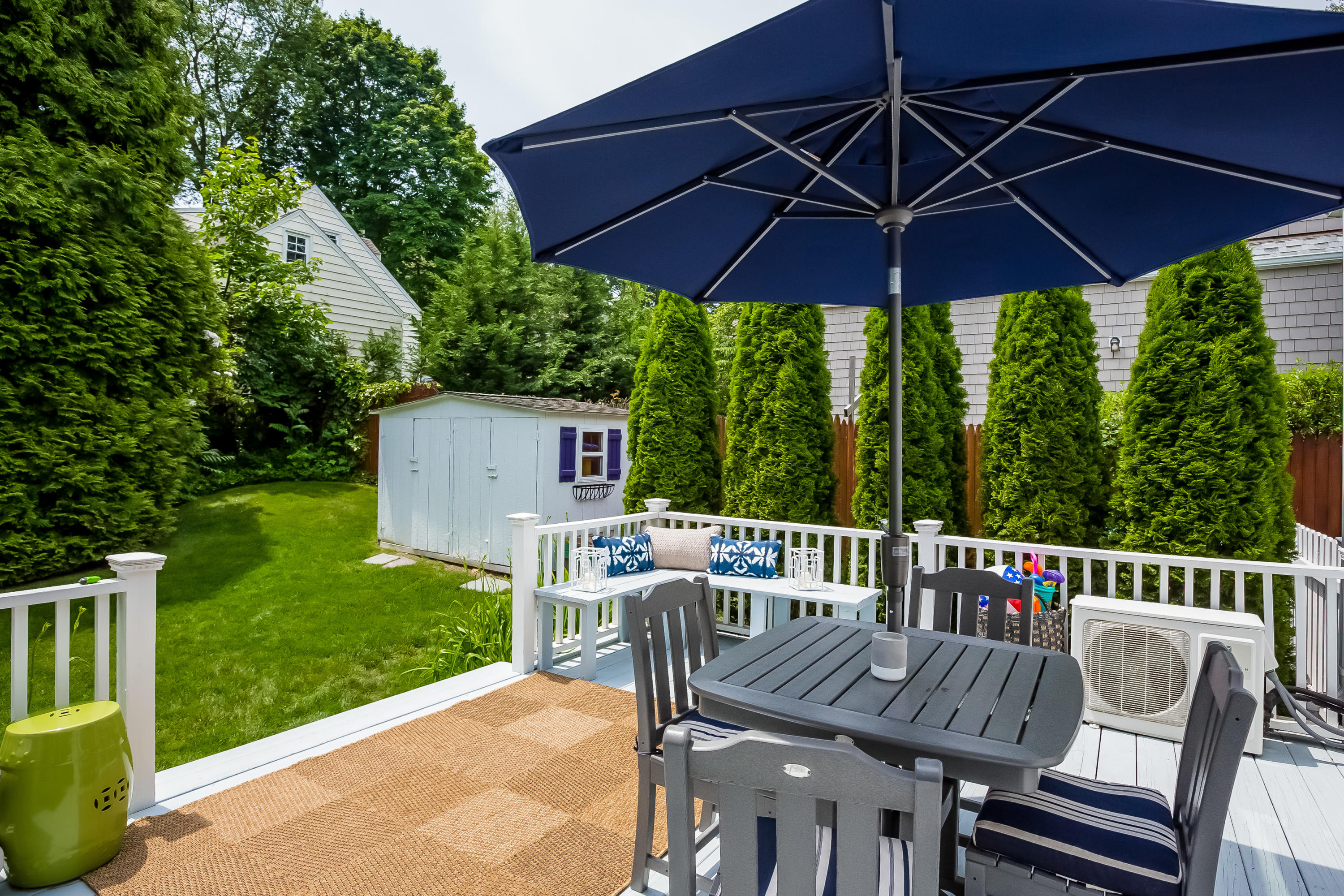 82 Linden Avenue Darien, CT 06820 - Photo 23 of 28 a view of an outdoor sitting area with furniture and backyard