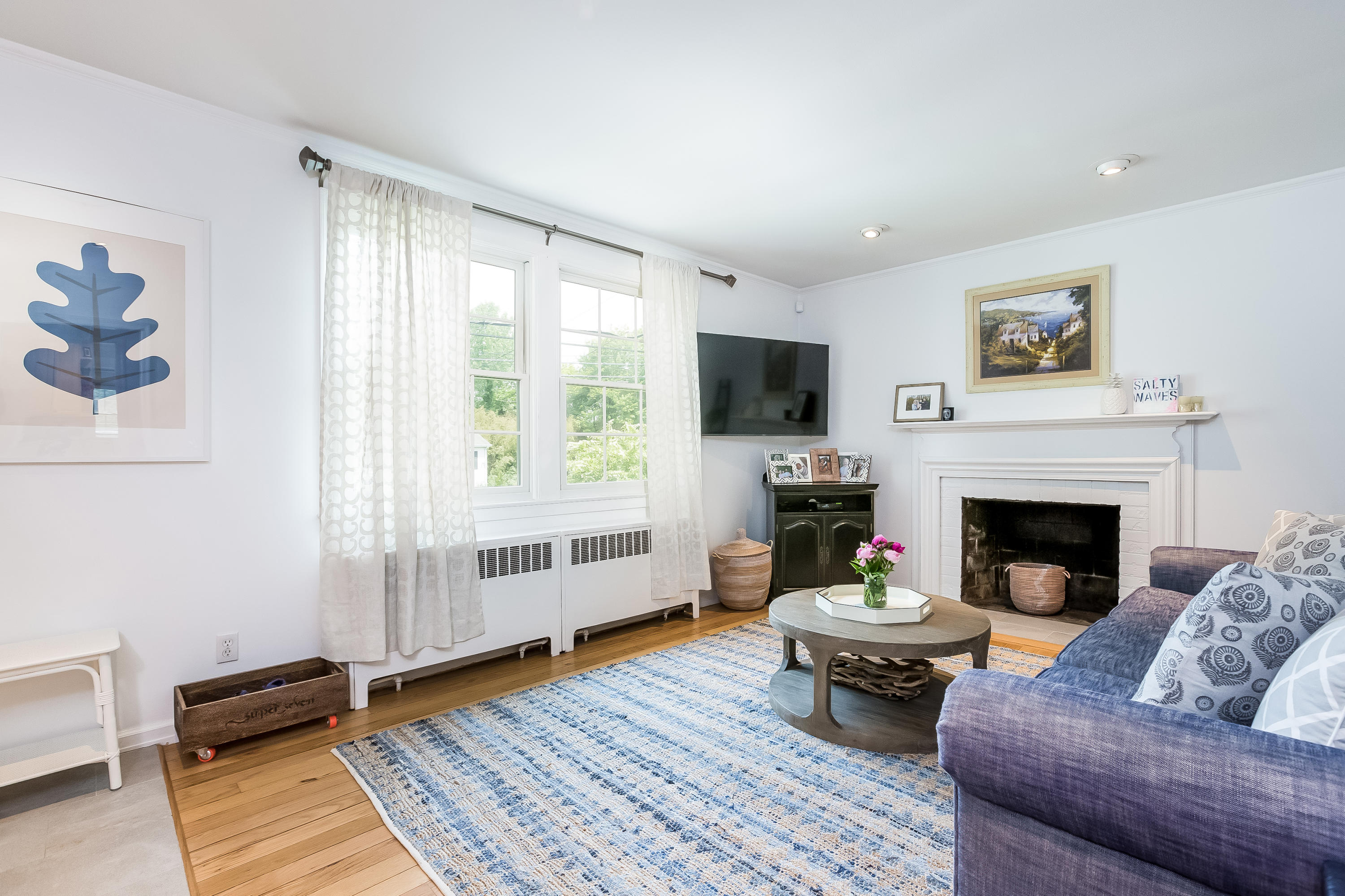 82 Linden Avenue Darien, CT 06820 - Photo 9 of 28 a living room with furniture fireplace and window