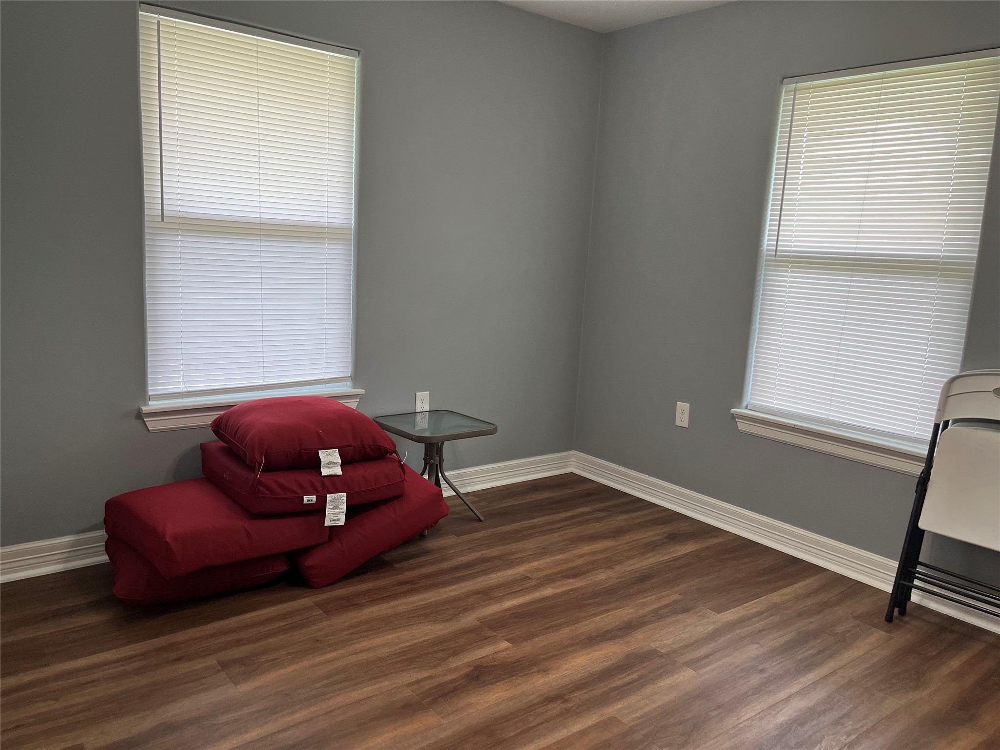 21511 Rio Villa Drive Houston, TX 77049 - Photo 42 of 45 a room with a window and wooden floor