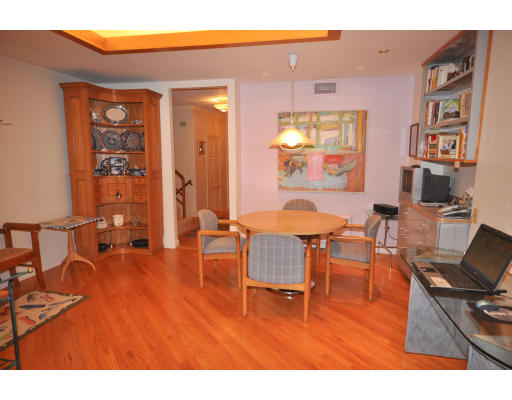 184 Paulson Road Newton, MA 02468 - Photo 5 of 15 a living room with furniture a dining table and chairs with wooden floor