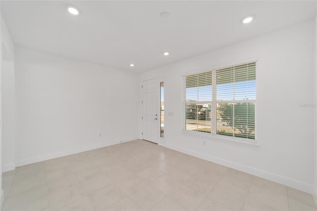 7276 Southwest 58th Place Road Ocala, FL 34474 - Photo 11 of 44 an empty room with a window