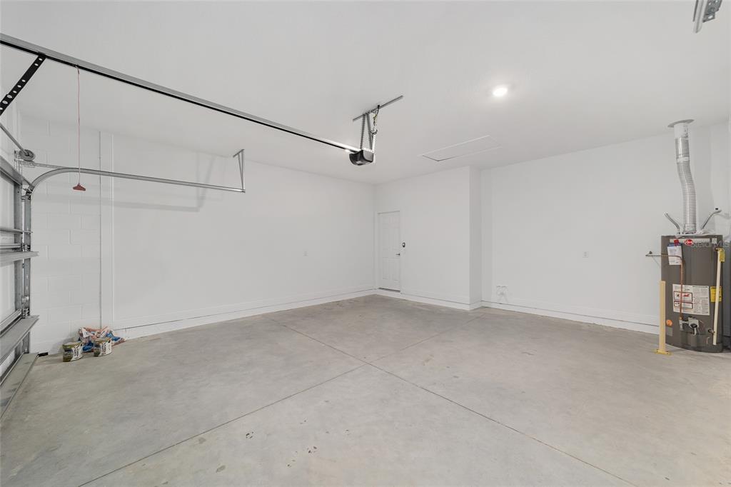 7276 Southwest 58th Place Road Ocala, FL 34474 - Photo 40 of 44 a view of a room with rack on the wall