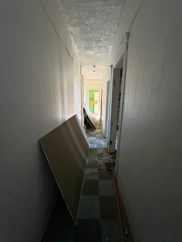 a kitchen with a sink and a stove top oven