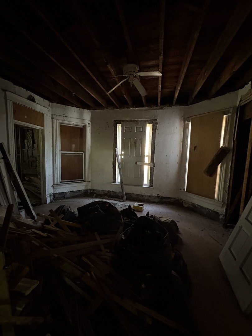 318 West 75th Street Chicago, IL 60621 - Photo 16 of 20 a front view of a house with stairs