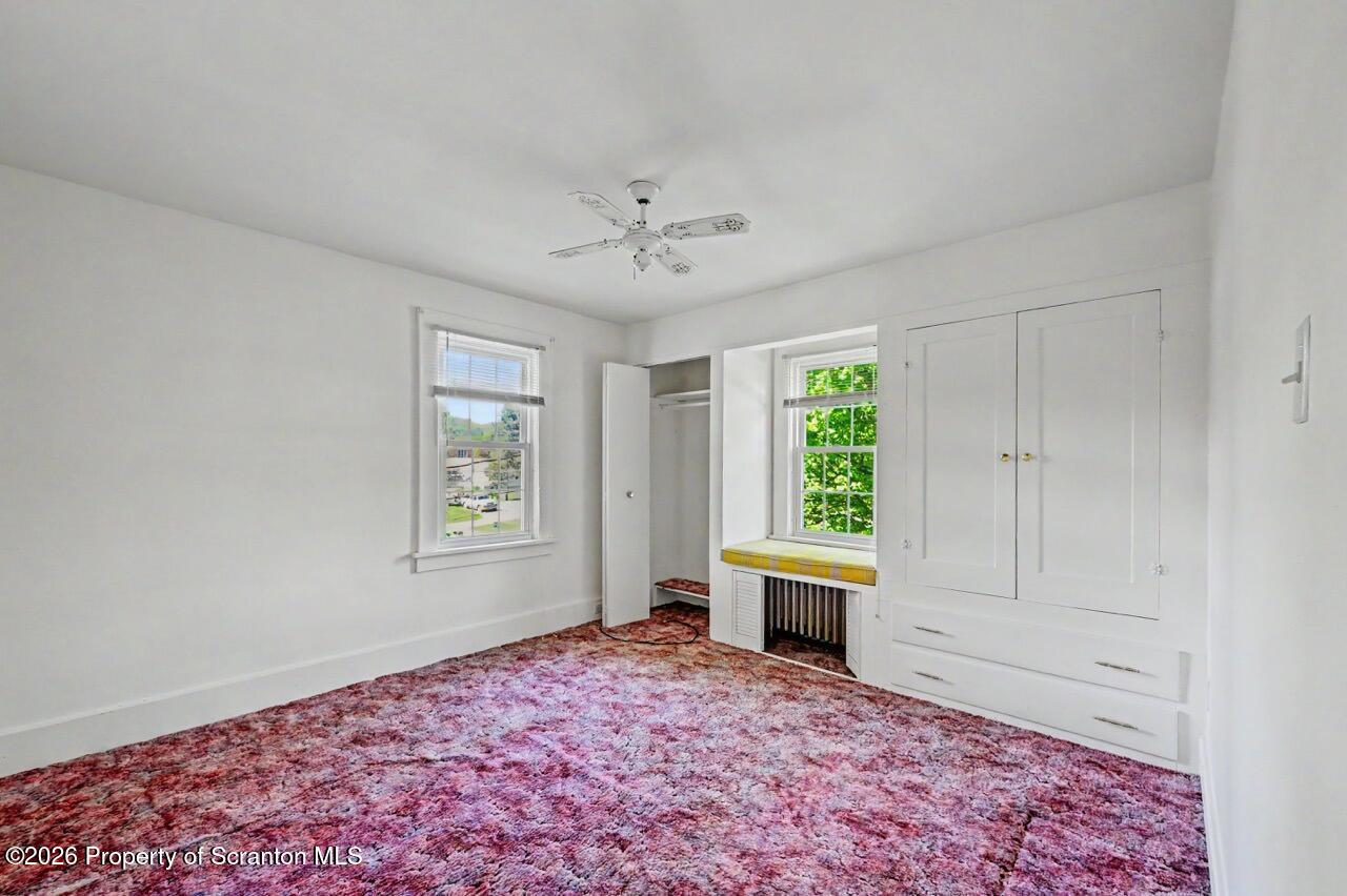 502 Layton Road Clarks Summit, PA 18411 - Photo 27 of 42 a bedroom with a bed and a window