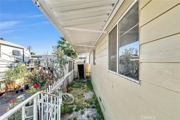 a view of a house with a flower plants