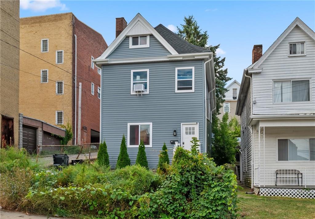 11 Maytide Street Pittsburgh, PA 15227 - Photo 2 of 8 front view of a house with a yard