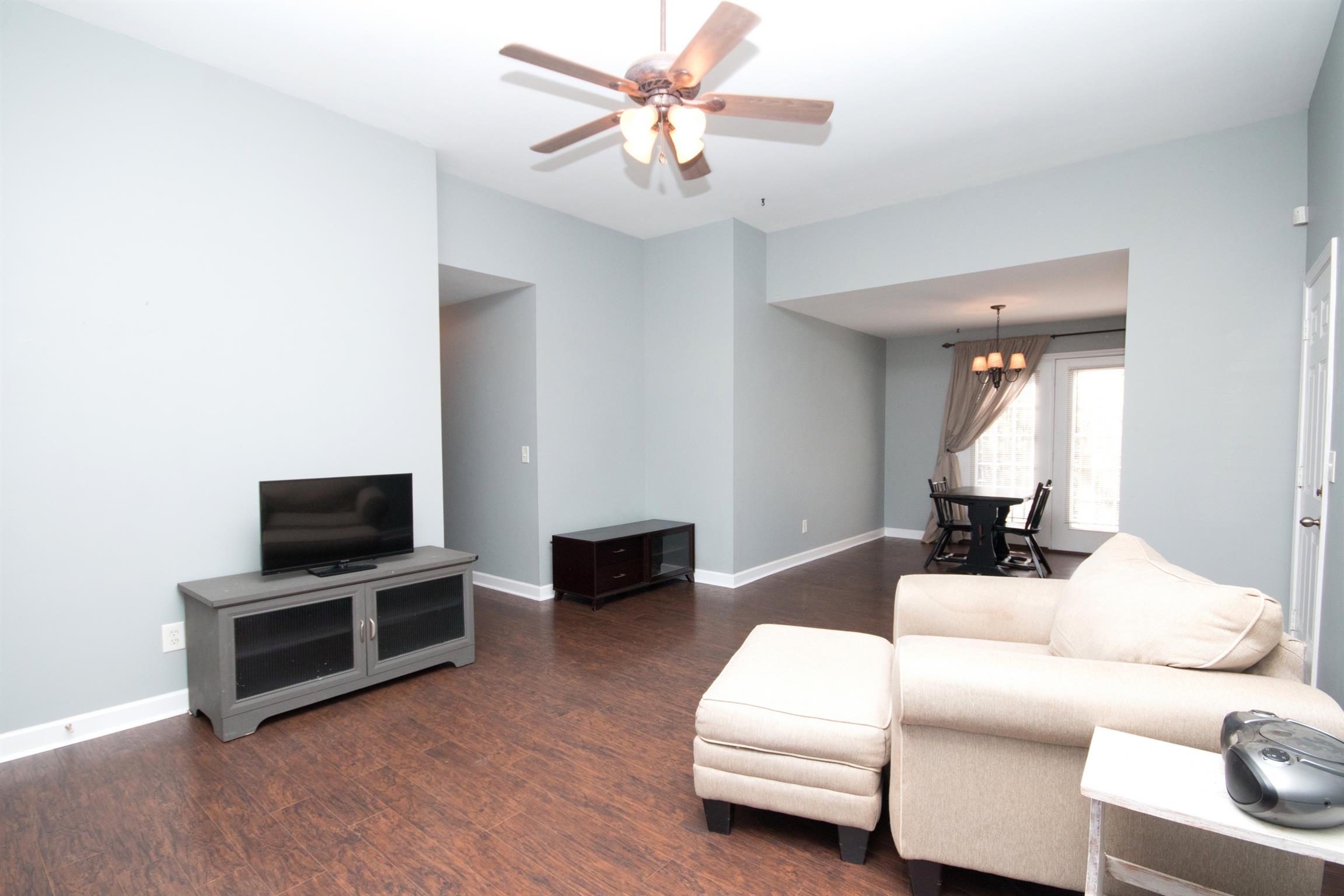 560 Rothwood Avenue Madison, TN 37115 - Photo 5 of 28 a living room with furniture and a flat screen tv